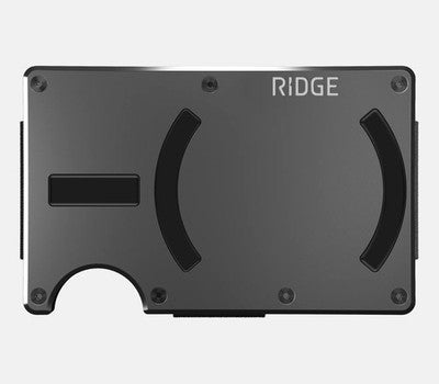 The Ridge Aluminum MagSafe Wallet in gunmetal with RFID-blocking card slots and integrated MagSafe for iPhone
