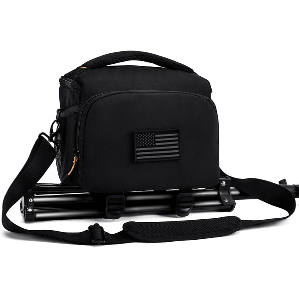 AMOZZ black camera sling bag with a tripod strapped underneath and shoulder strap