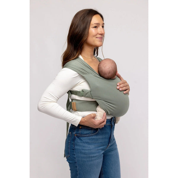 WildBird Aerial buckle wrap newborn baby carrier in the Acadian sage colourway, worn front carry