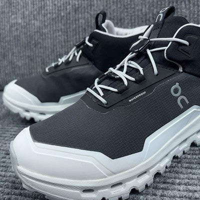 On kids' US 3 shoes with black and white, waterproof